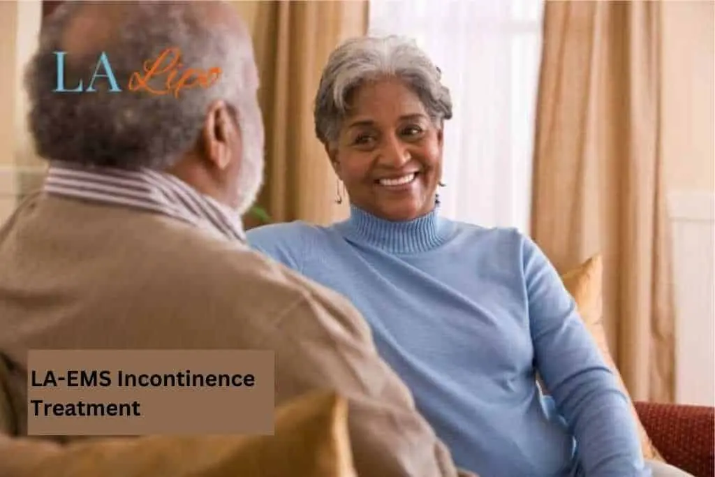 Couple sat smiling at each other - LA-EMS treatment Fareham